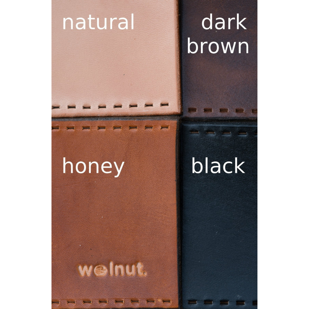 Leather color swatch in natural outdoor light showing the four leather colors labeled: Natural, Honey, Dark Brown, and Black