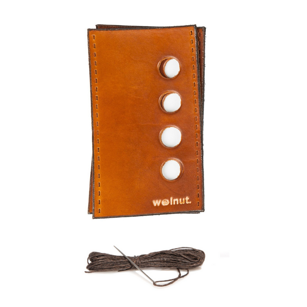 White background variant photo showing the product as it comes in the package: Honey leather with dark brown thread