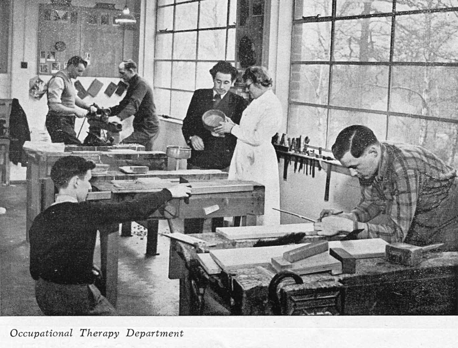 Historic photo of the Occupational Therapy Department, an army division that healed veterans with PTSD with a crafting working and craft kits