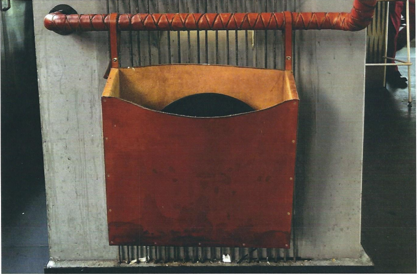 Close-up image of a leather-wrapped bar service rail in a high-end restaurant