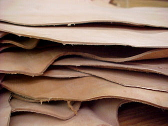 Stack of vegetable-tanned leather hides