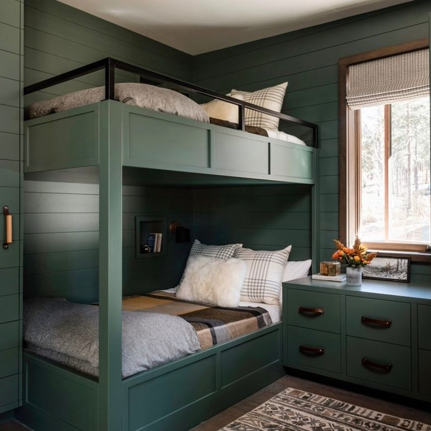 Customer photo of deep green bunk beds with dark brown leather handles and pulls