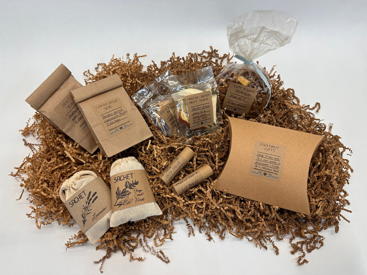 Collection of natural products including soap bars and packaging on a white background
