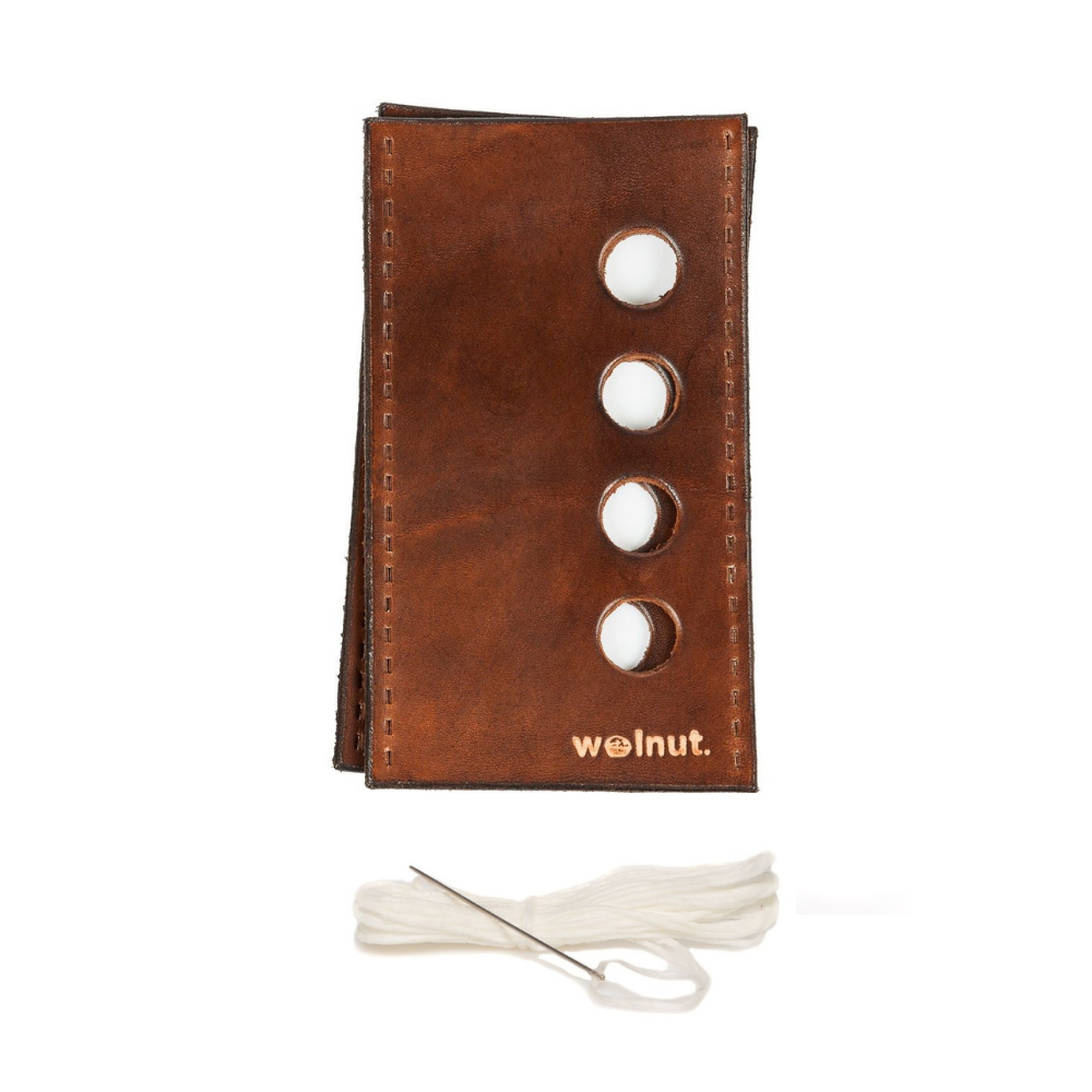 White background variant photo showing the product as it comes in the package: Dark Brown leather with white thread