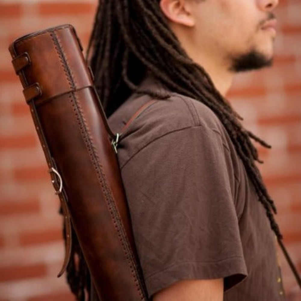 Man wearing dark brown variant of the Blueprint Tube with shoulder strap
